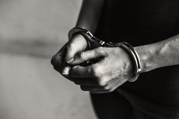 criminal in handcuffs 2022 09 16 09 01 20 utc